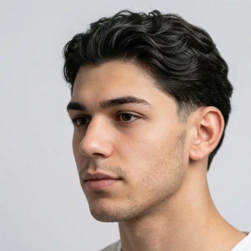 Long low taper fade wavy hair for men with natural waves and clean tapered sides