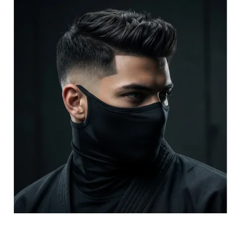Low taper fade ninja inspired haircut with clean sides and modern textured top