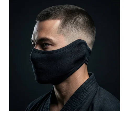 Low taper fade ninja short hair with clean sides and neatly trimmed top