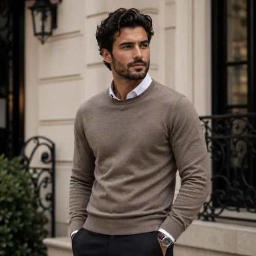 Layered sweater over a collared shirt creating a sophisticated casual outfit