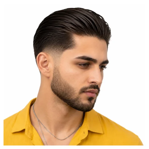 Slick back low taper fade side part featuring combed-back hair, a defined side part, and clean faded sides for a sleek look